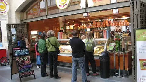 Customers at a gelato bar